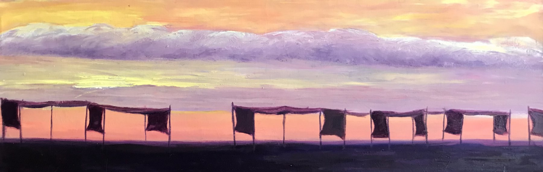 Beach umbrellas at sunset - Ecuador - Laurence Blanchard