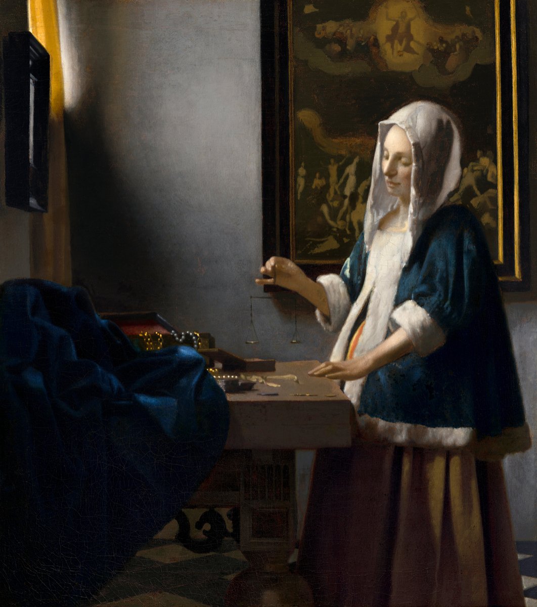 Woman Holding a Balance - Johannes Vermeer
